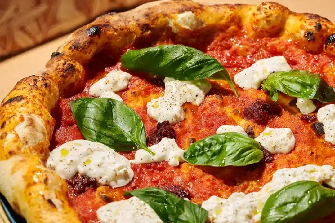 Pizza Margherita Piccante con Burrata featured on our seasonal Italian menu
