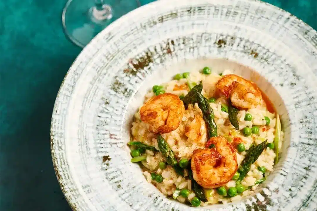 Risotto Primavery con Gamberoni featured on our seasonal Italian menu