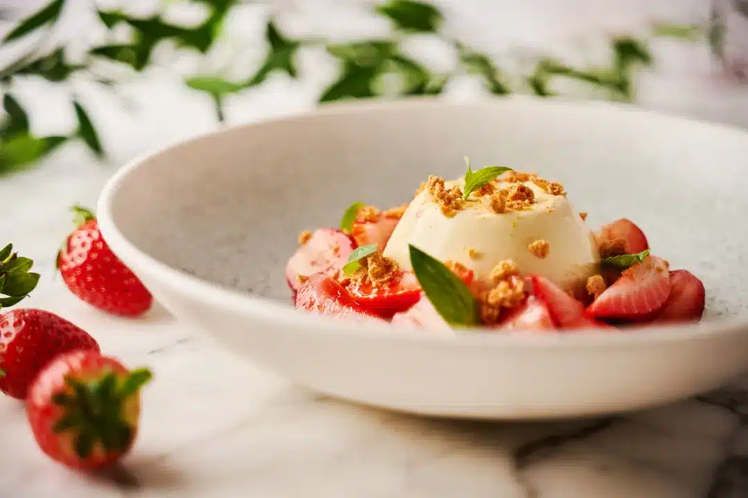 Panna Cotta with Strawberries featured on our seasonal Italian menu