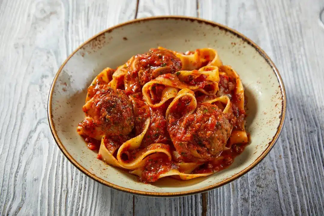 Pappardelle con Polpette featured on our seasonal Italian menu